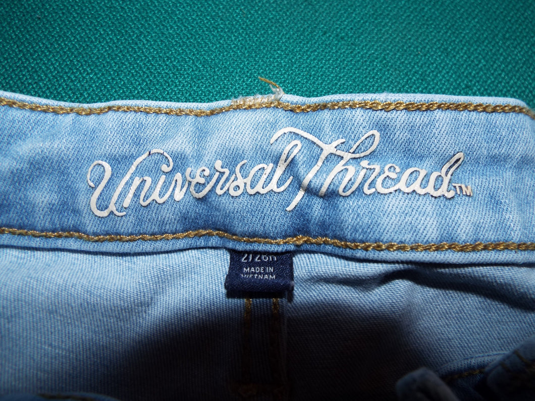 Universal Thread Size 2 Woman's Jeans.  Previously worn good value. May run a bit small due to washings. Ripped Jean Style.