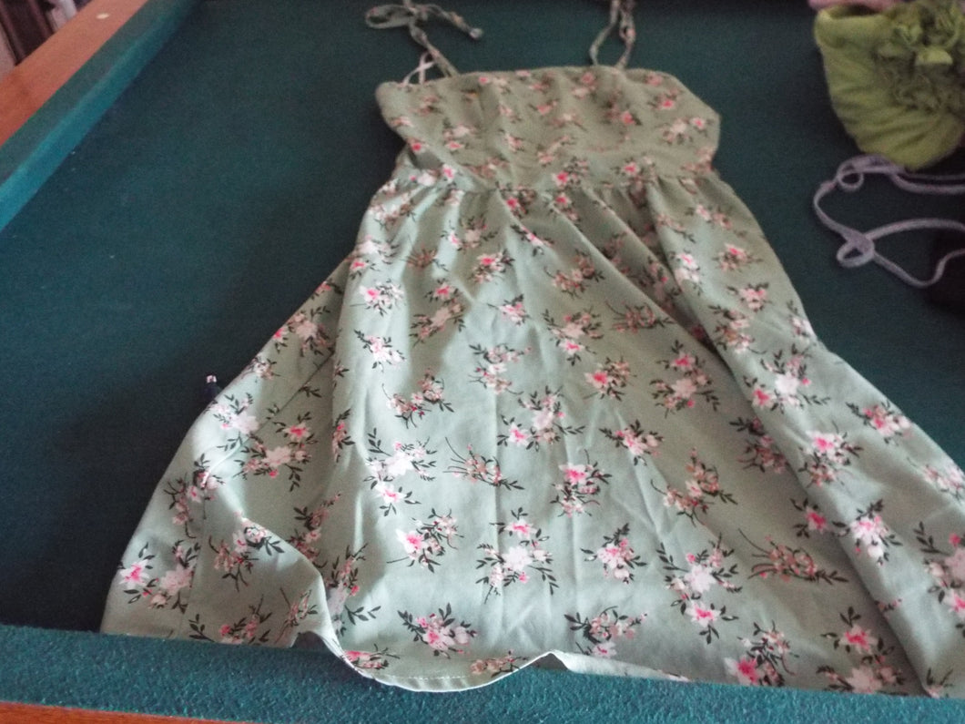 Green sundress size S. Previously worn and in good condition.